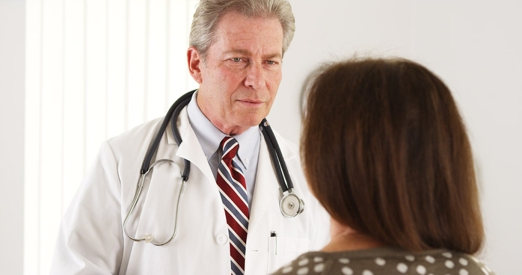 Senior doctor having a conversation with patient